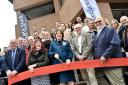 The Lord Lieutenant, Clare, Countess of Euston, cuts the ribbon to declare the new offices open