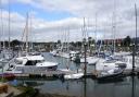 The man was rescued from a boat at Fox's Marina in Ipswich