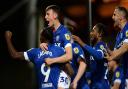 Cameron Humphries celebrates Freddie Ladapo scoring the third goal for Ipswich at Port Vale.