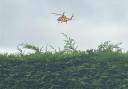 An air ambulance has been spotted in Ipswich after a crash between a motorbike and a car