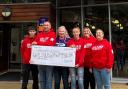 Group of friends raise thousands for charity with 56-mile walk