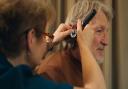 Former Ipswich Town legend Russell Osman has his ears checked by All About Hearing audiologist Karen Finch. He is challenging the stigma around wearing hearing aids