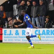 Panutche Camara makes his debut at Cambridge United.