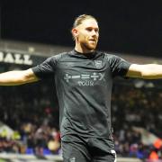 Wes Burns celebrates after scoring the only goal of the game.