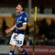 Cameron Humphreys celebrates after the final whistle at Port Vale.