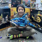 7-year-old Beaumont with his LEGO shark design. Credit: Supplied by family