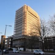 St Francis Tower in Ipswich is still wrapped up as cladding is removed.