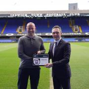 Tom Ball, of Ipswich Town Football Club, and John Dugmore, of Suffolk Chamber, with the patron certificate