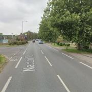 An ambulance was called after a bike collided with a car in Ipswich