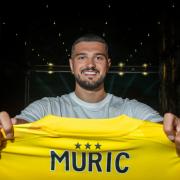 Arijanet Muric joins Ipswich Town from Burnley, signing a four-year contract