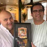 Jason Berryman (right) was delighted to meet Keith Stafford and his family this weekend, having reunited Mr Stafford with his uncle Private Samuel Harvey's miniature WWI medals. Image: Mark Brennan