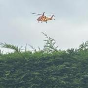 An air ambulance has been spotted in Ipswich after a crash between a motorbike and a car