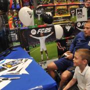 Caden Allen taking on Clarke at FC25 during a launch event at Smyths Toys in Ipswich.