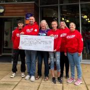 Group of friends raise thousands for charity with 56-mile walk