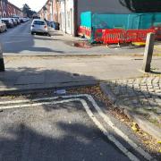 Residents are annoyed with drivers riding over pavements due to a missing bollard.