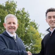 Tim Goulding, managing director of Ipswich Computers, handing over the reins to Craig Starling