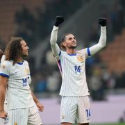 Adrien Rabiot, right, was the hero for France (Luca Bruno/AP)