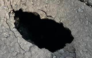 A sinkhole appeared at a road in Ipswich at the weekend