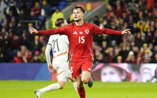 Liam Cullen celebrates the first of his two goals in Wales’ 4-1 Nations League victory against Iceland (Nick Potts/PA)