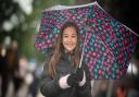 Maddi splashing around in the rain on the first day of the Suffolk Show