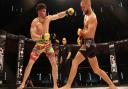 Steve Aimable, left, dropped a points decision to featherweight champion in a non-title fight Mads Burnell at Cage Warriors 111, but he's still my fighter of the year. Picture: ROSS HALLS