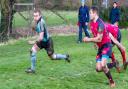 Woodbridge's Adam Plummer crosses at Wisbech. Picture: SIMON BALLARD