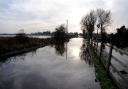 Bridge Road in Snape. Flood water from the tidal surge has started to recede.