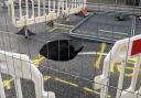 A huge sinkhole has closed Foxhall Road in Ipswich