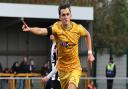 Finley Barbrook celebrates his first goal for Sutton United.