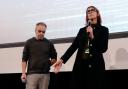 Director Joel Souza, left, and cinematographer Bianca Cline, right, attend the premiere of the film Rust in Torun, Poland (Czarek Sokolowski/AP)