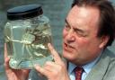 Deputy Prime Minister John Prescott takes a close look at a Chinese Mitten Crab called Dennis (Ben Curtis/PA)