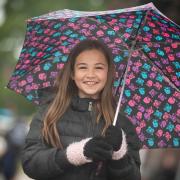 Maddi splashing around in the rain on the first day of the Suffolk Show