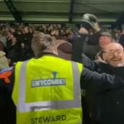 Ipswich Town fans celebrate during the Blues' big 4-1 win at Wycombe last night