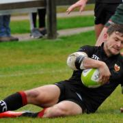 Colchester's Ben Murphy scores one of his six tries in their 112-0 win over Luton. Picture: RICHARD PARKER