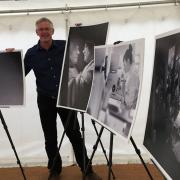 Photographer Warren Page with his exhibition at the Suffolk Show to celebrate 70 years of the NHS   Picture: GEMMA MITCHELL