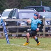 Felix Kibble crosses for Woodbridge against West Norfolk. Picture: SIMON BALLARD