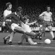 Ipswich Town legend Trevor Whymark,  pictured playing for Town in 1972, has died at the age of 74