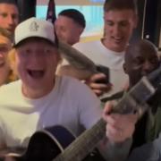 Ed Sheeran celebrated with Ipswich Town players after they gained promotion