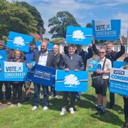 Richard Holden and Tom Hunt with Conservative supporters in Ipswich.