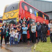 Children welcome new Ipswich playbus, Dennis, so that beloved playbus Maggie can enjoy a well-earned rest. Image: Charlotte Bond