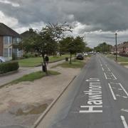 Armed police were called to a road in Ipswich after reports of a man with a knife