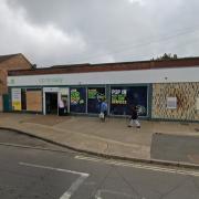 Masked men raided an Ipswich co-op