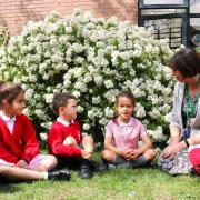 Broke Hall headteacher Ruth Fairs with pupils.