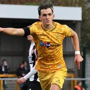 Finley Barbrook celebrates his first goal for Sutton United.