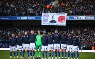 A minute’s silence before Ipswich Town’s match with Swansea City in November 2023.